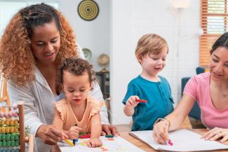 woman caring for toddlers